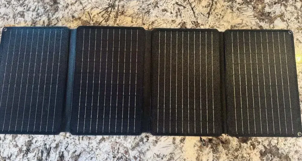Portable Solar Panel Charger with Integrated Power Bank and Multi-Port Output